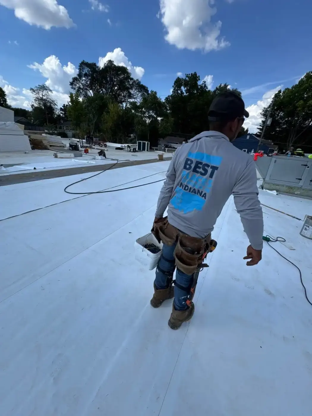 Tarping and dry-in on a Cambridge City commercial roof